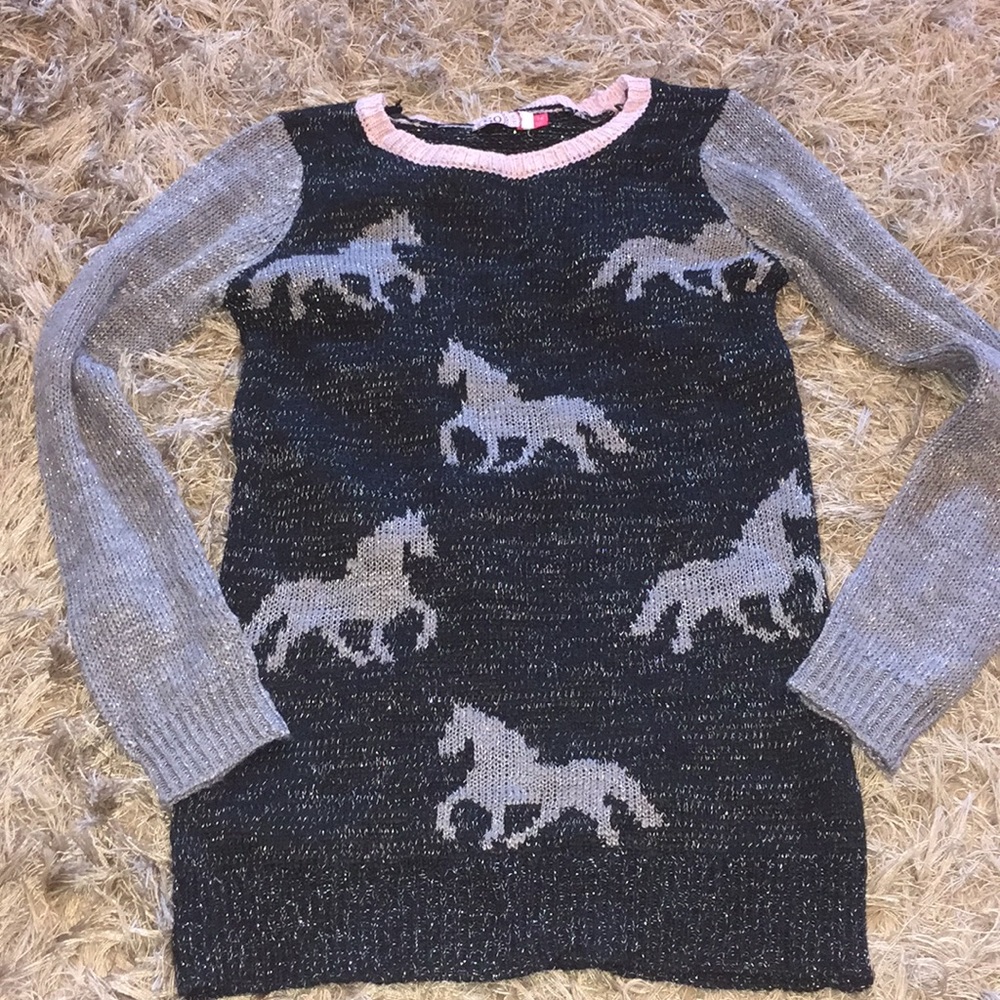 Girls sparkly sweater.